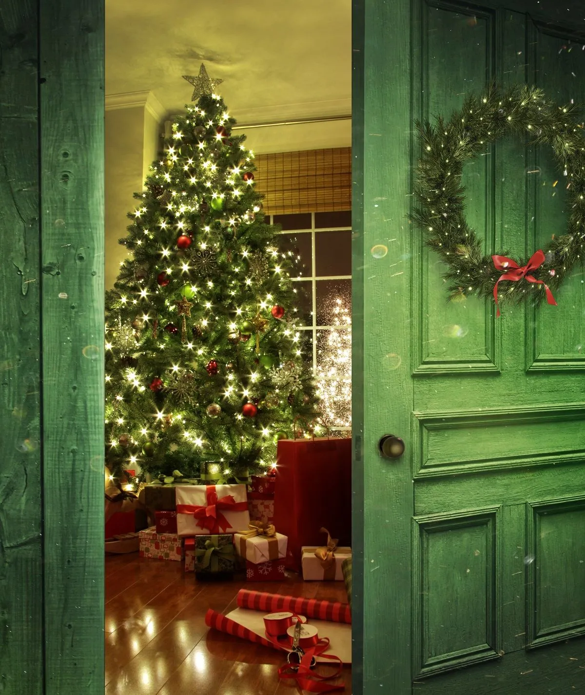 Christmas tree seen through door